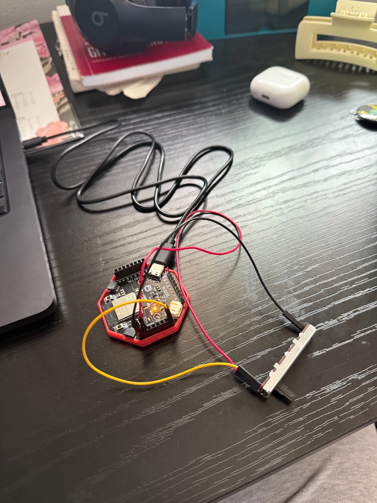 Wiring a microcontroller to a slider input for the exhibit's control panel
